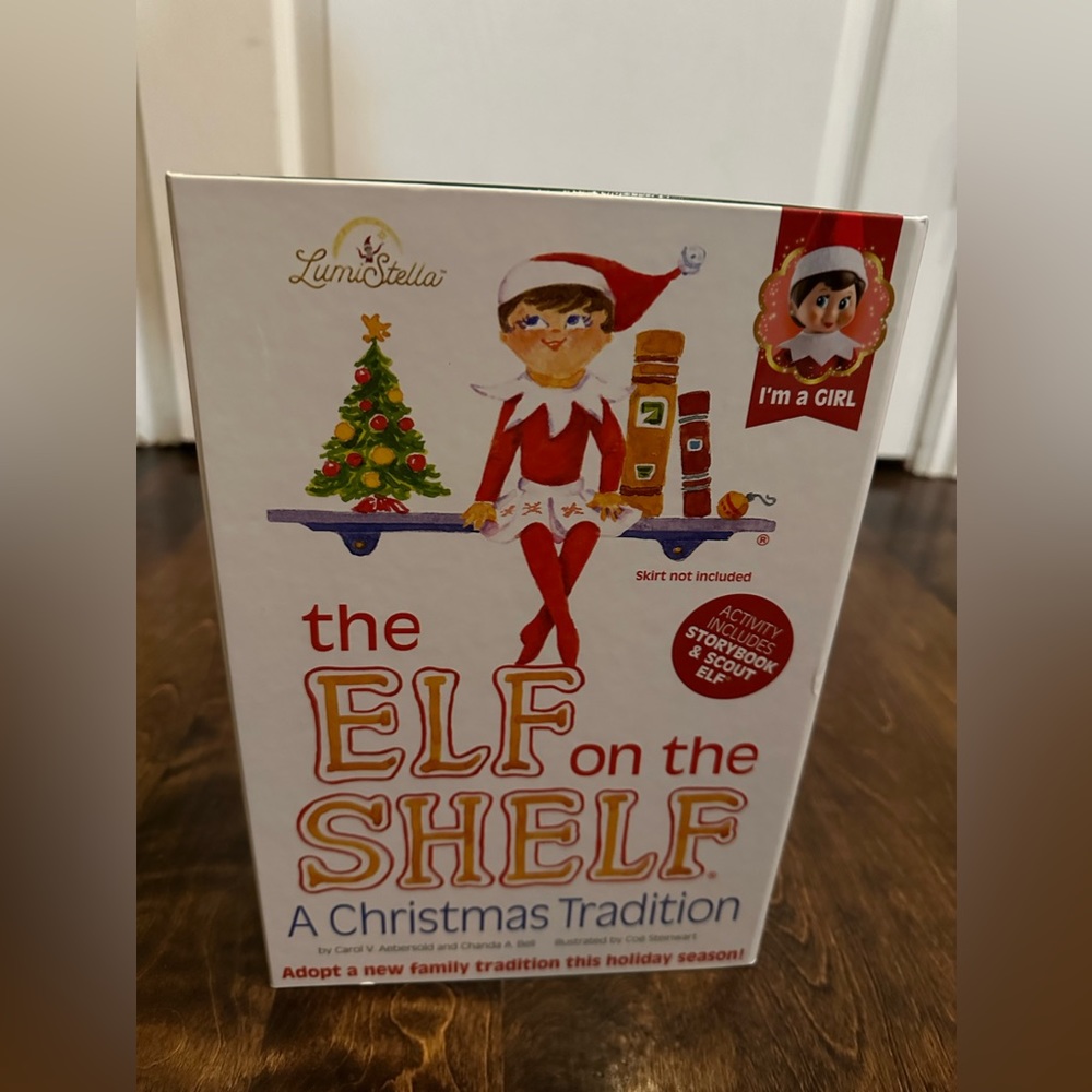 This set includes an adoptable girl Scout Elf® & book.